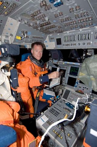 Shuttle Astronauts to Dock at Space Station Today