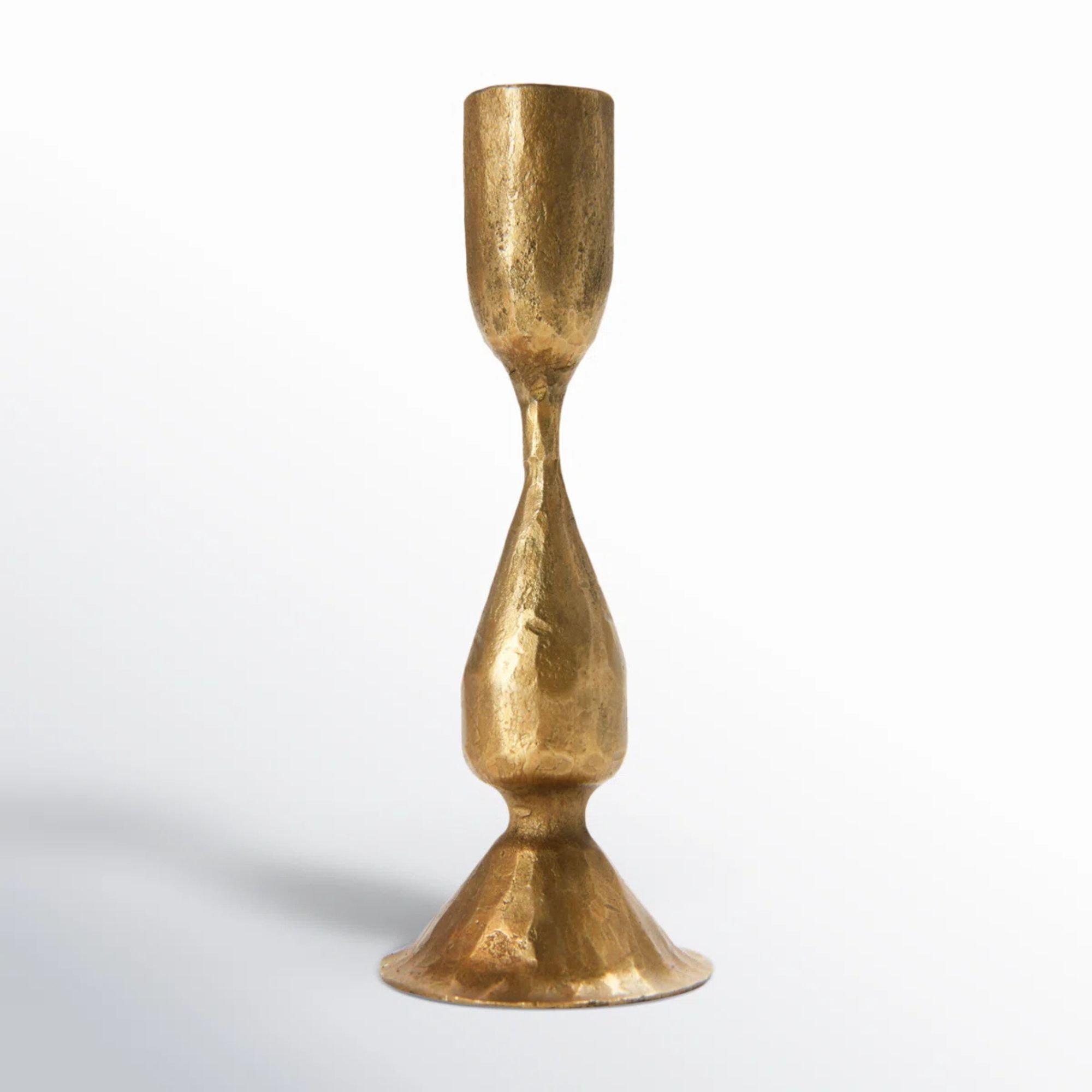6.5 inch Iron candlestick with an aged brass finish, $33, Wayfair