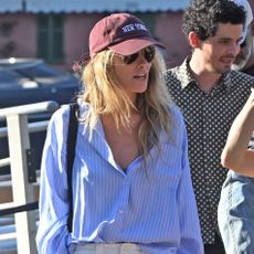 Olivia Wilde wears white jeans and embellished flats on vacation in Portofino, Italy