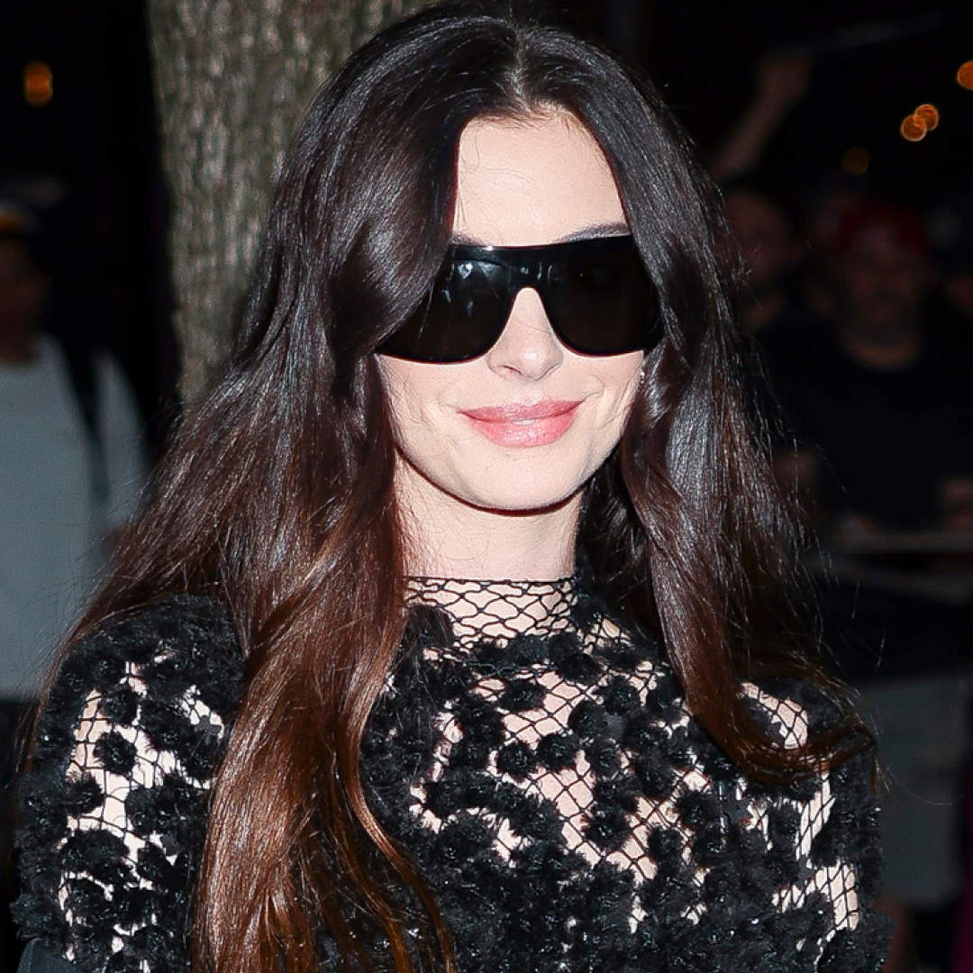 Anne Hathaway wore a naked Calvin Klein dress with a small Longchamp bag