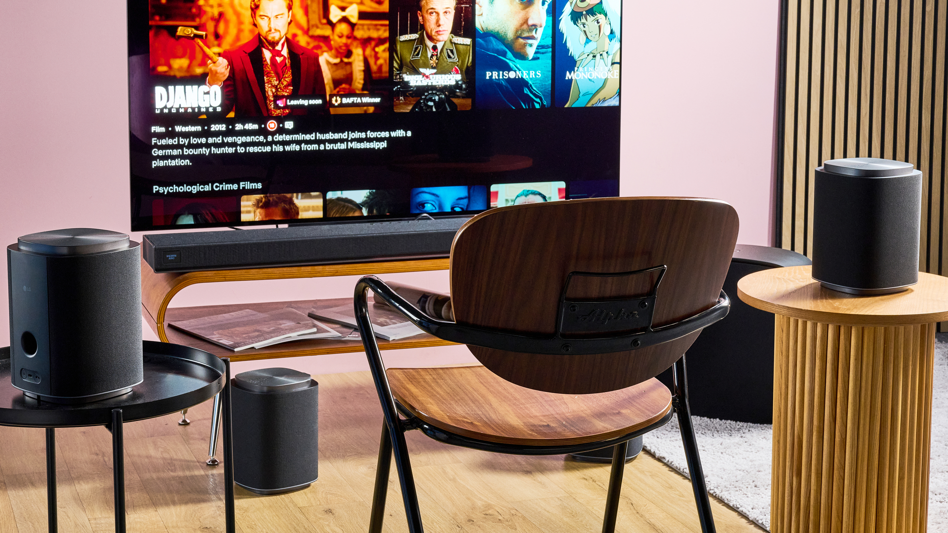 LG Sound Suite Immersive Suite 7 Pro set up with LG TV and chair