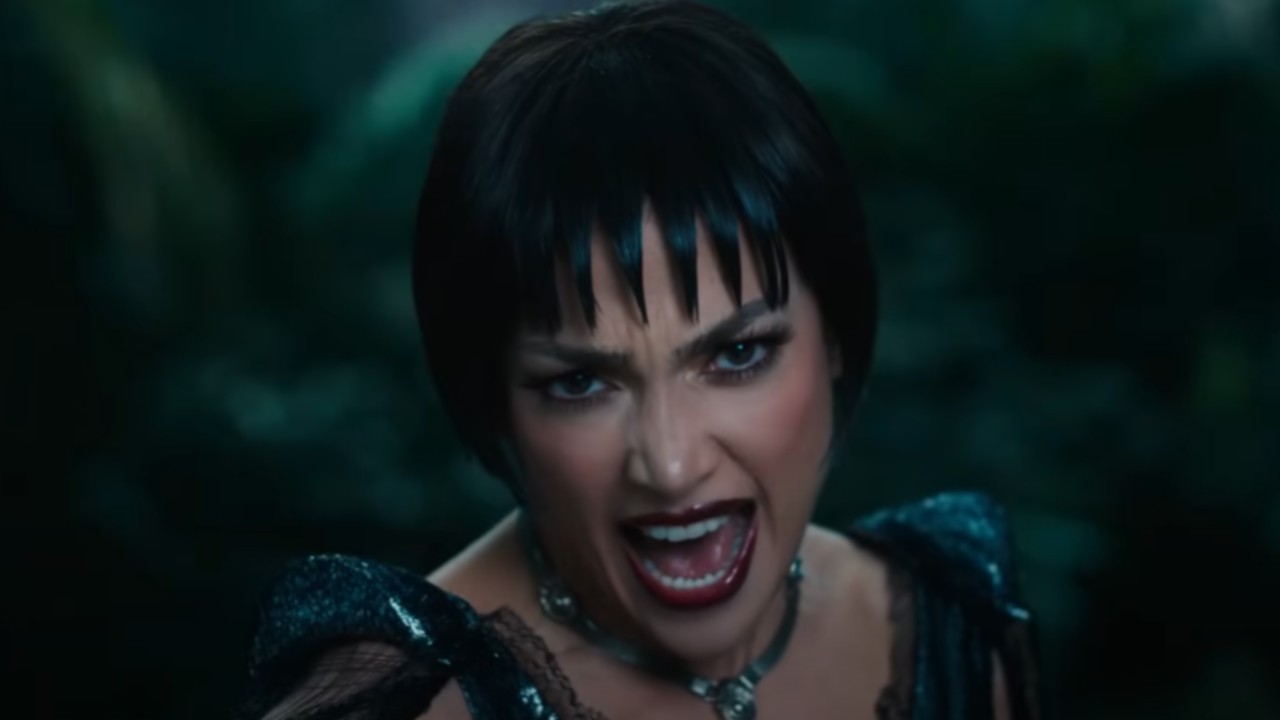 JLo with a short black bob sining in The Kiss of the Spider Woman.