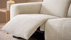 a white cord reclining sofa design