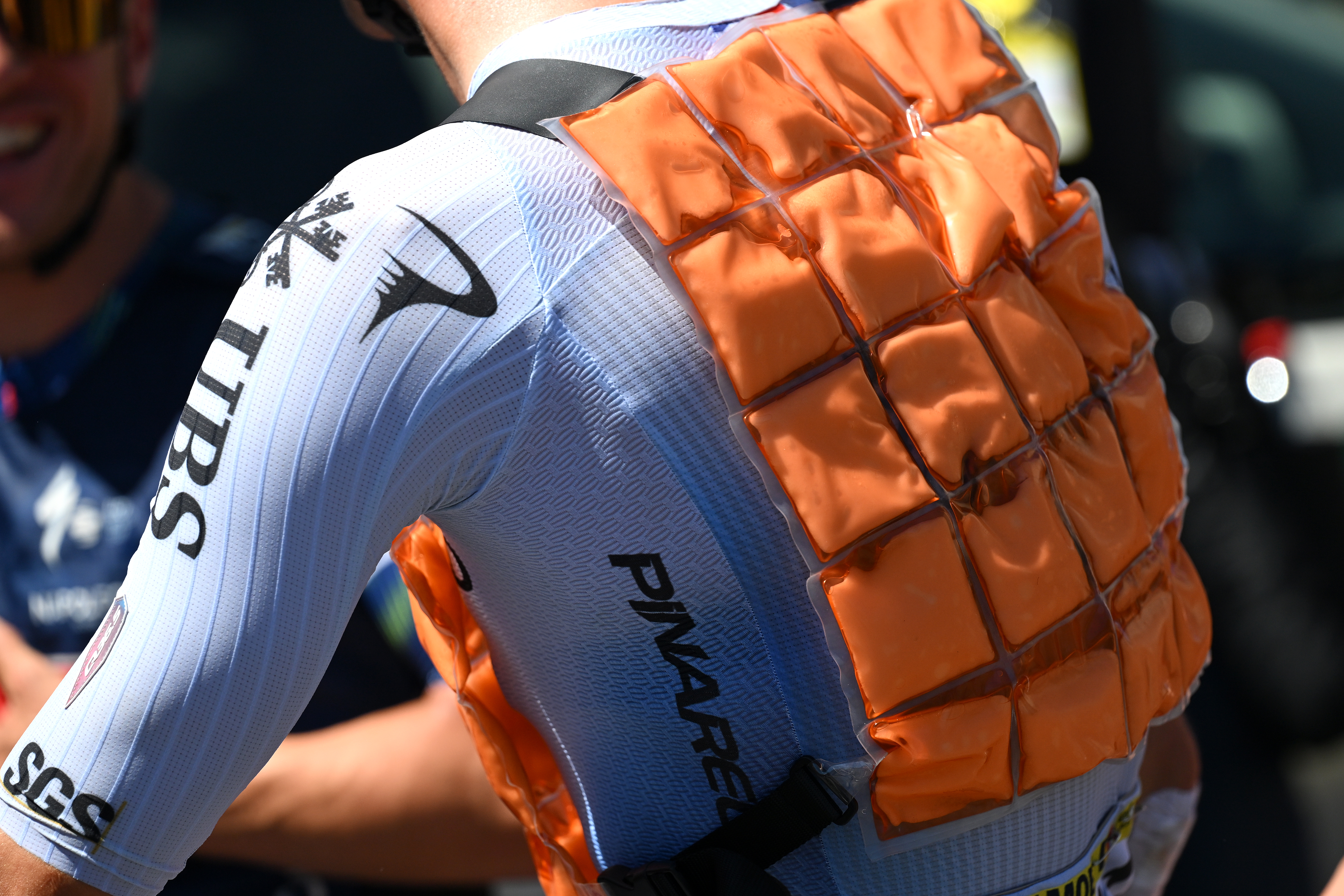 A Pinarello Q36.5 rider in an ice vest