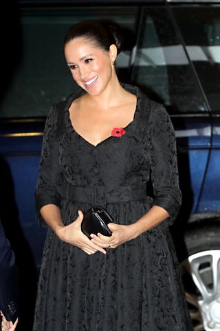 Meghan Markle wearing Jessica McCormack earrings at an event in 2019