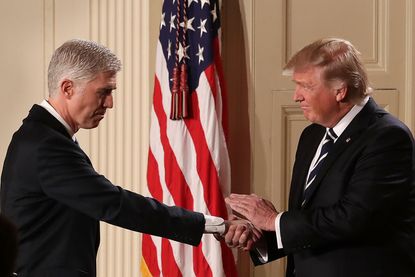 President Trump shakes the hand of Neil Gorsuch
