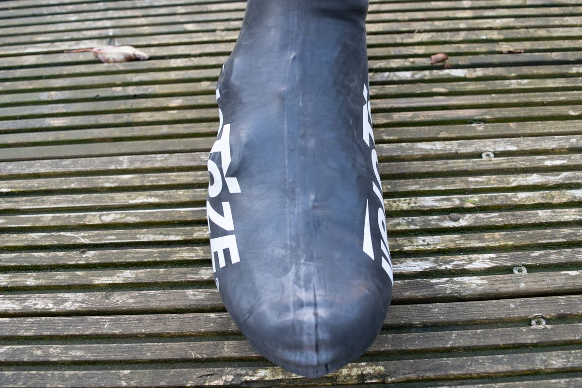 A rider wearing the Velotoze Latzex overshoes