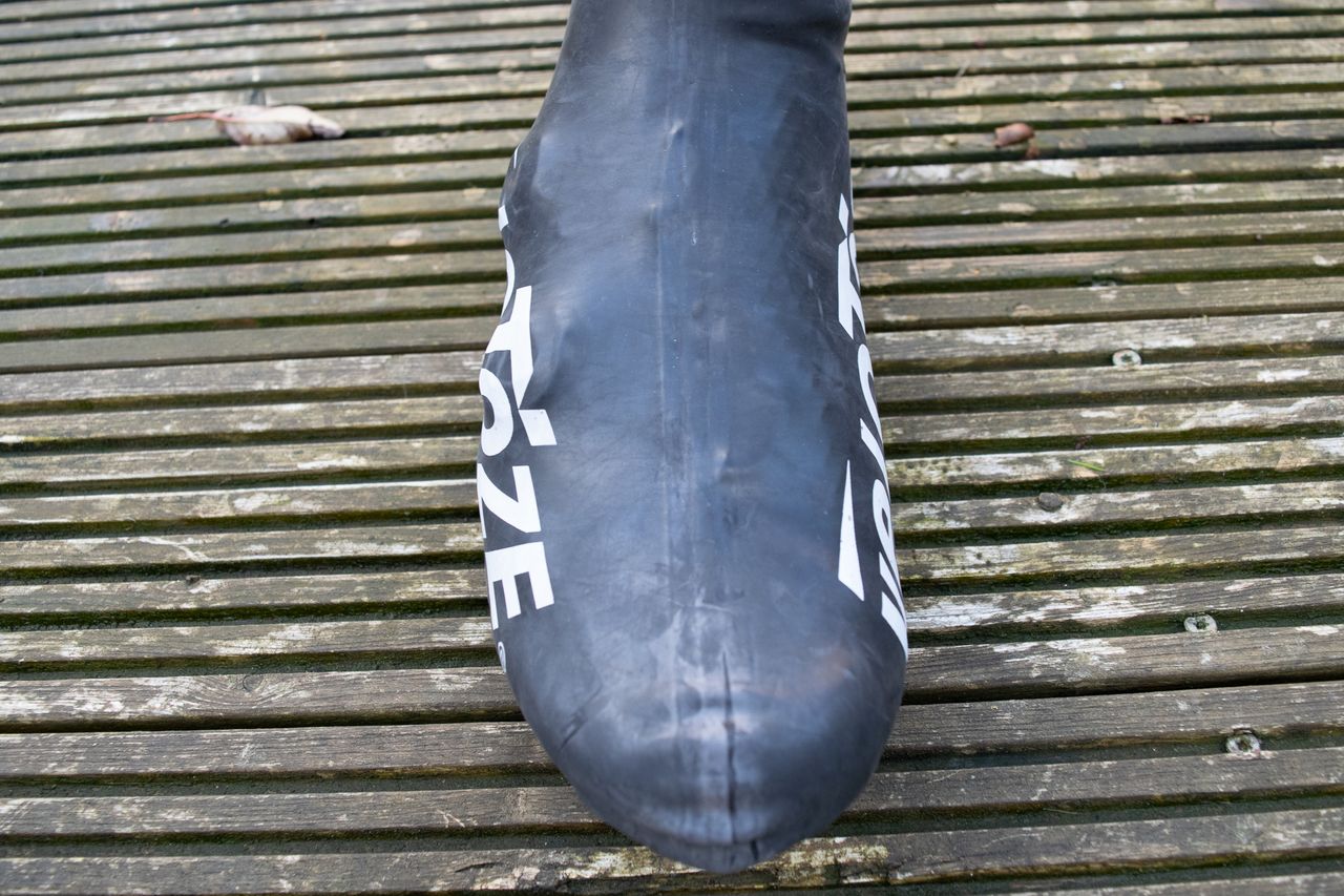 A rider wearing the Velotoze Latzex overshoes