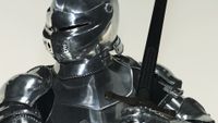 An image of a shiny medieval knight-style suit of armor