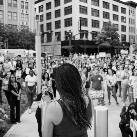 Adrianne Wright speaking at a rally.