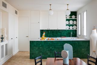 Green glazed tiling in the kitchen