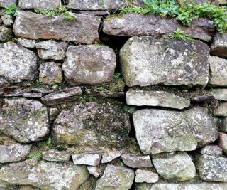 stone wall made up of stone bricks