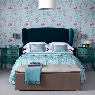 blue bedroom with floral wallpaper