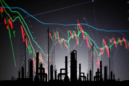 red and green bar chart with blue moving average superimposed over image of oil refinery
