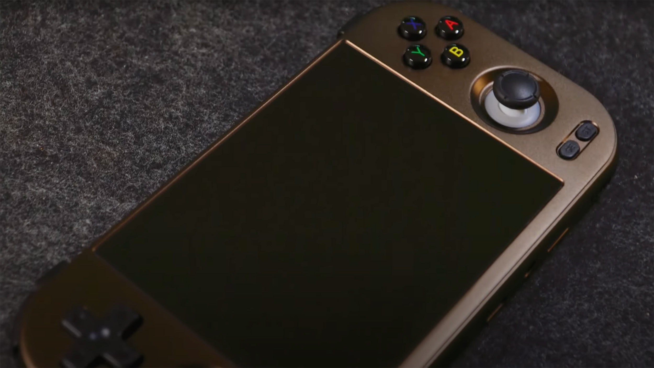 Anbernic RG477M bronze shell - angled