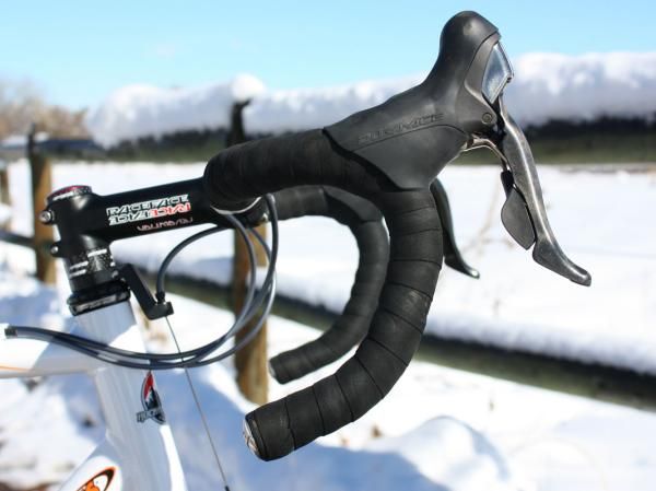 We're used to seeing upturned bars and high-mounted levers on pro 'cross bikes but Kabush's setup is especially so.