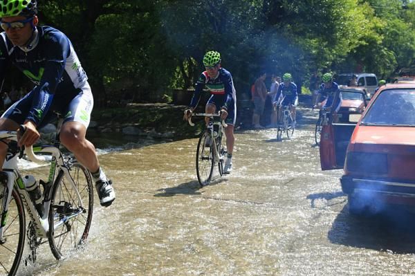 The Movistar team finds a flooded road