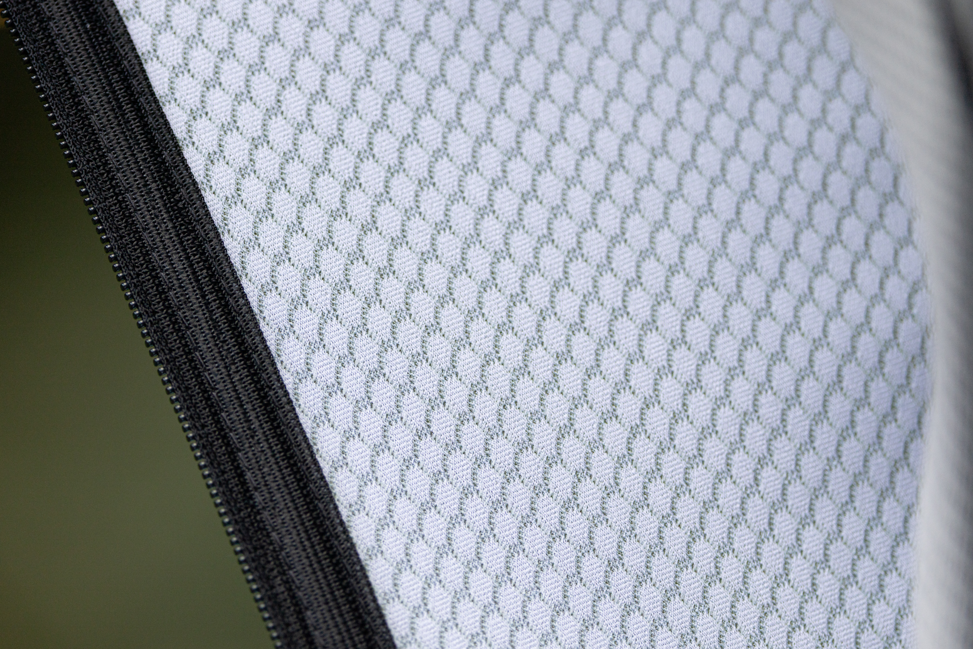 the inside of Assos AirCell fabric showing the open weave