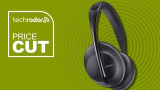 Bose Noise Cancelling Headphones 700 on green background with TechRadar's 'price cut' poster 