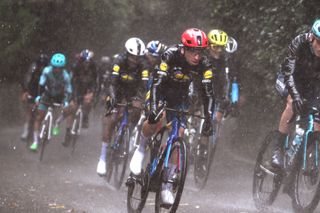 Giulio Ciccone of Italy and Team Lidl - Trek and team mates in their Santini rain jackets at the very wet 2024 Tre Valli Varesine 2024