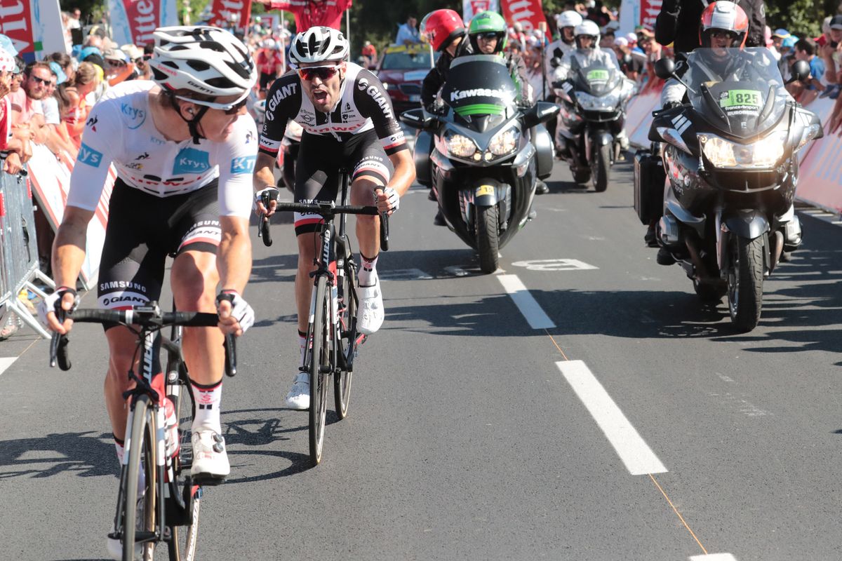 Best young rider Soren Kragh Andersen waits for Dumoulin