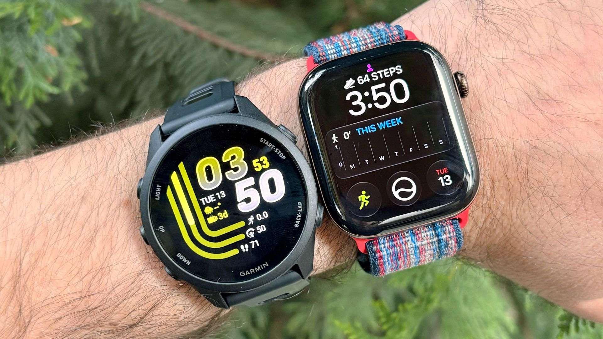 Close-up of the Garmin Forerunner 170 and Apple Watch 12 on a user's wrist