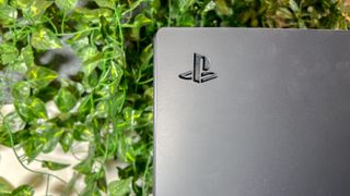 Midnight Black PS5 console cover - PS5 logo up close