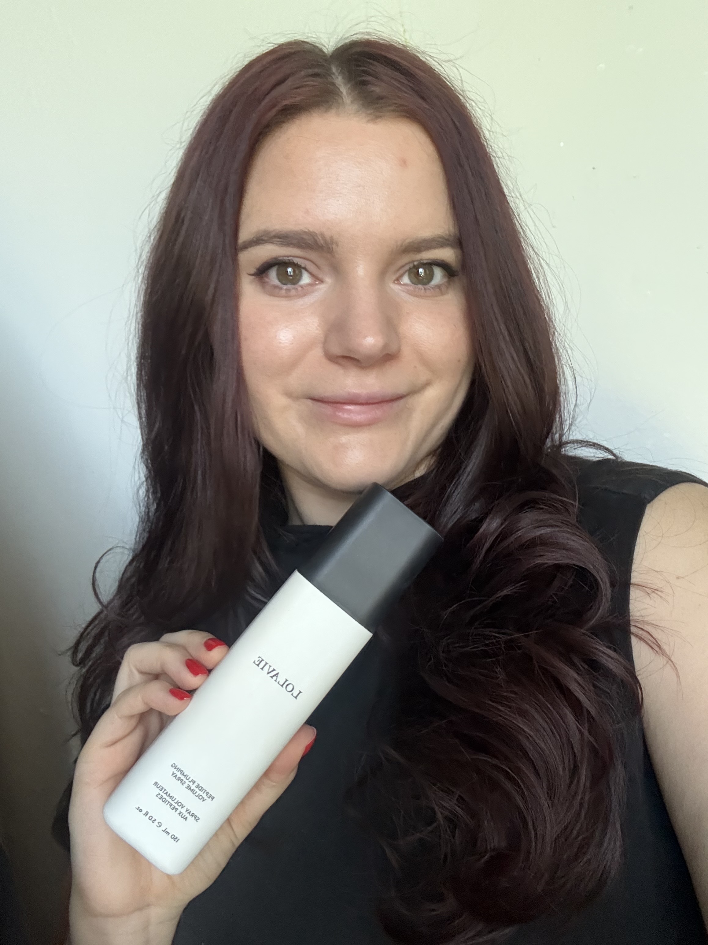Brooke Knappenberger associate commerce editor tests lolavie peptide volumizing spray