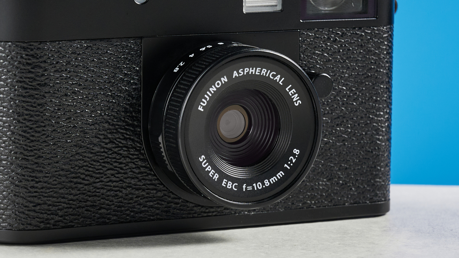 A black Fujifilm X half camera