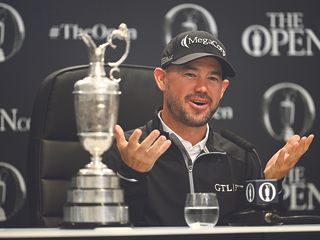 brian harman with the claret jug