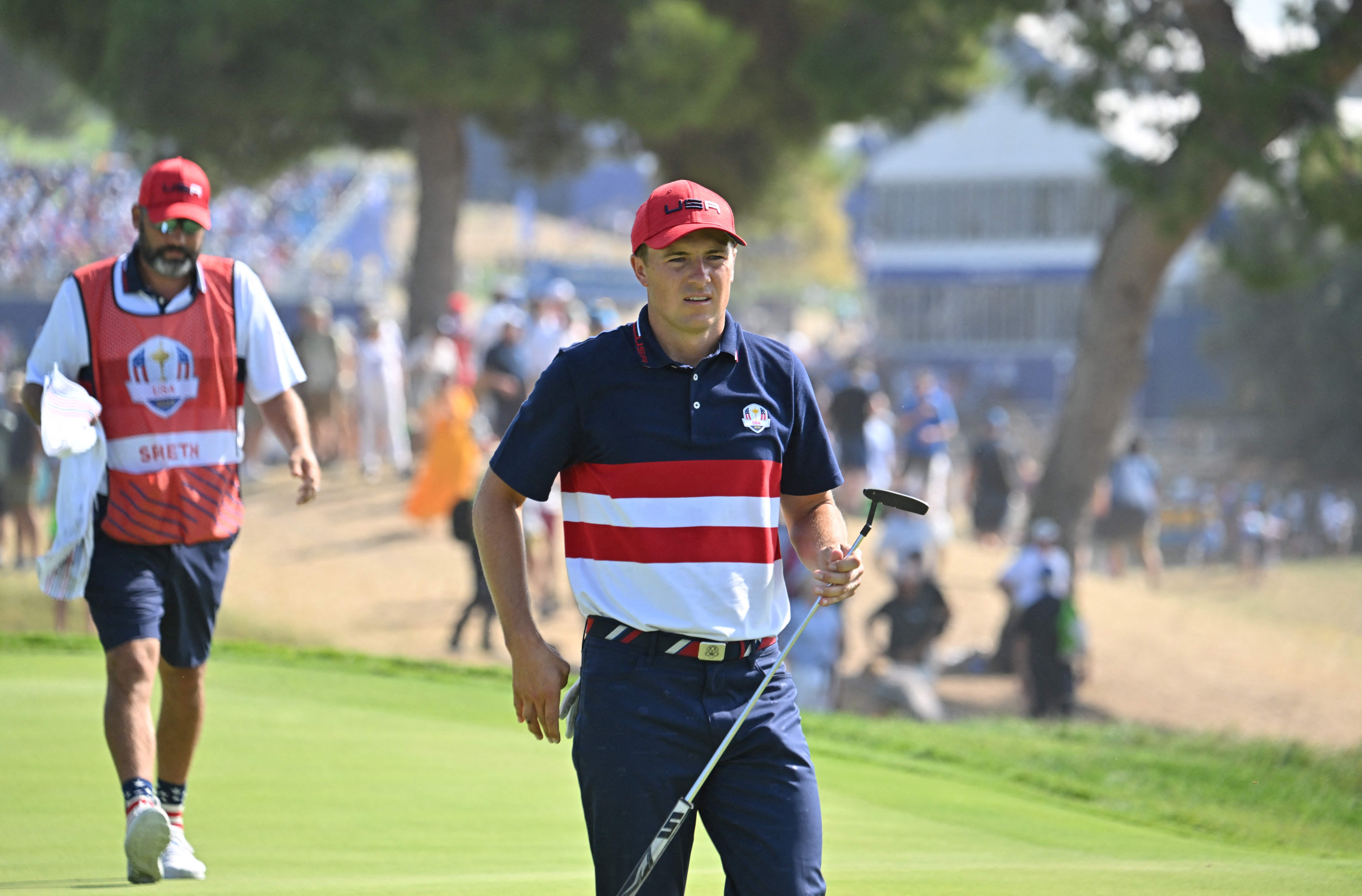 Jordan Spieth walks on to the green