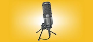 audio-technica at2020usb+ microphone against yellow background