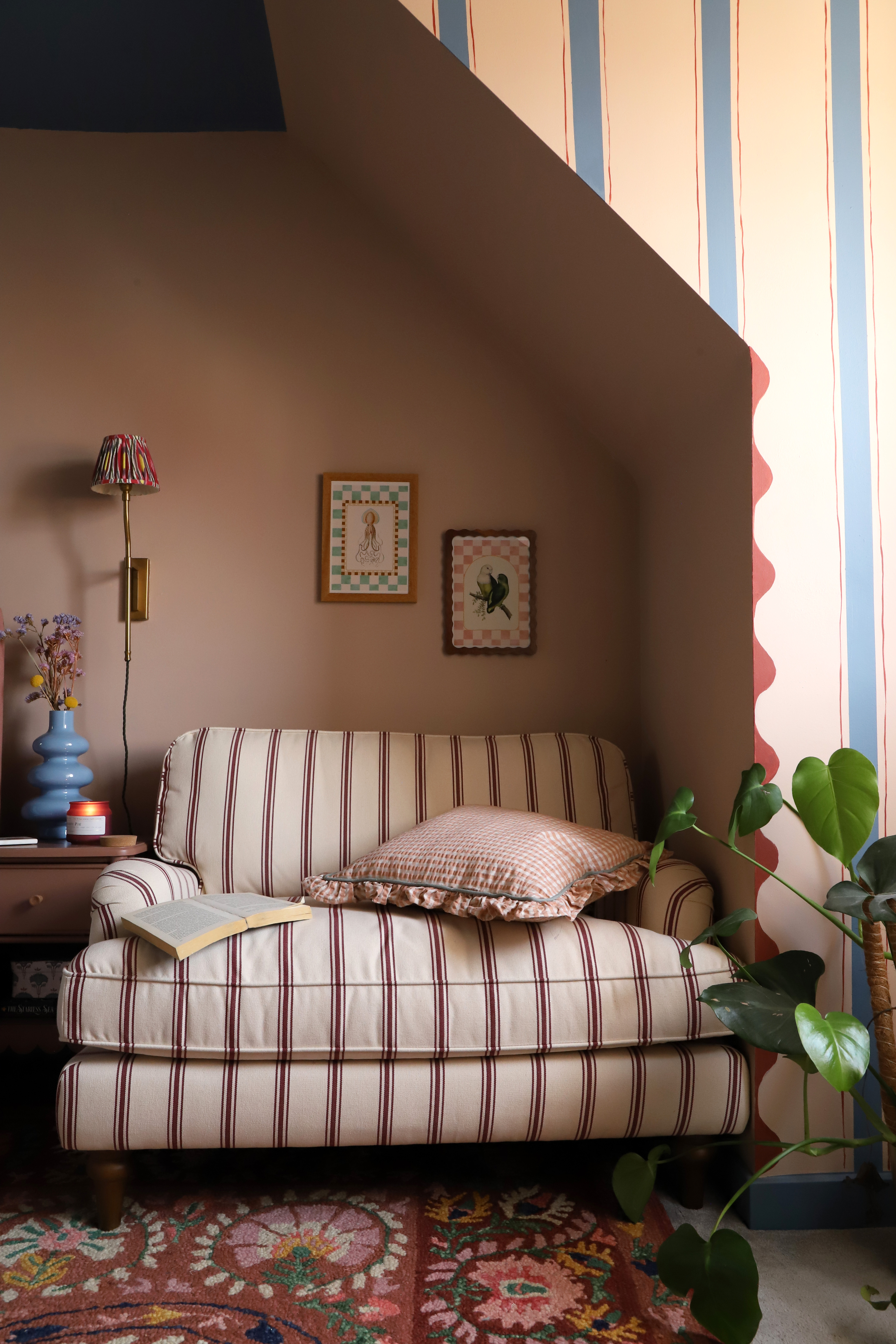 Richly layered interiors and exteriors shots of environments decorated with contrasting patterns, plush textiles, framed original artwork, pastel palettes, and plenty of natural light.