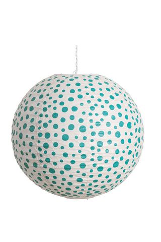white paper shade with mint dot pattern
