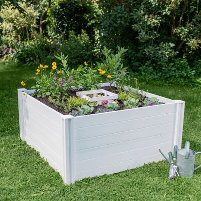 AI-altered image of a raised bed keyhole garden