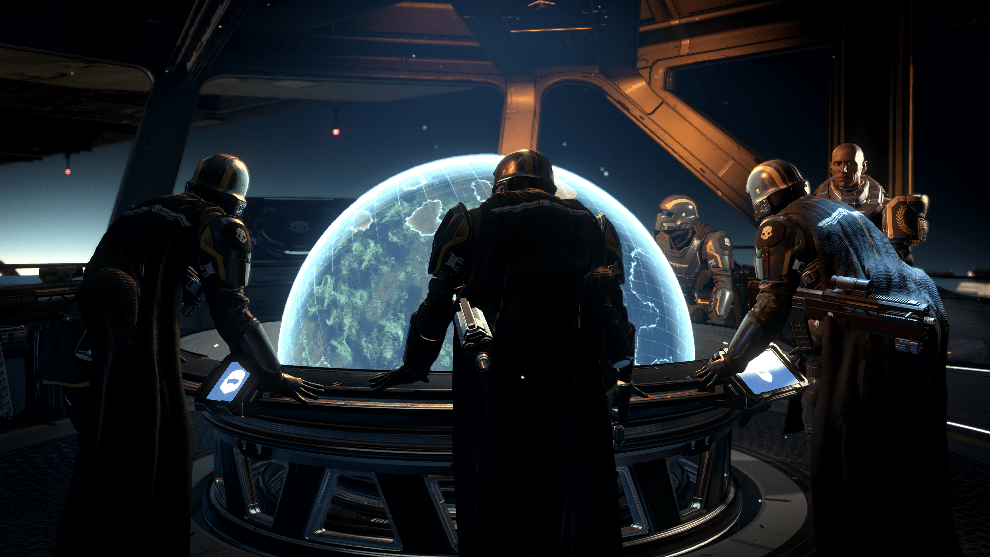 A group of Helldivers plan their next mission around a hologram of a planet in Helldivers 2.