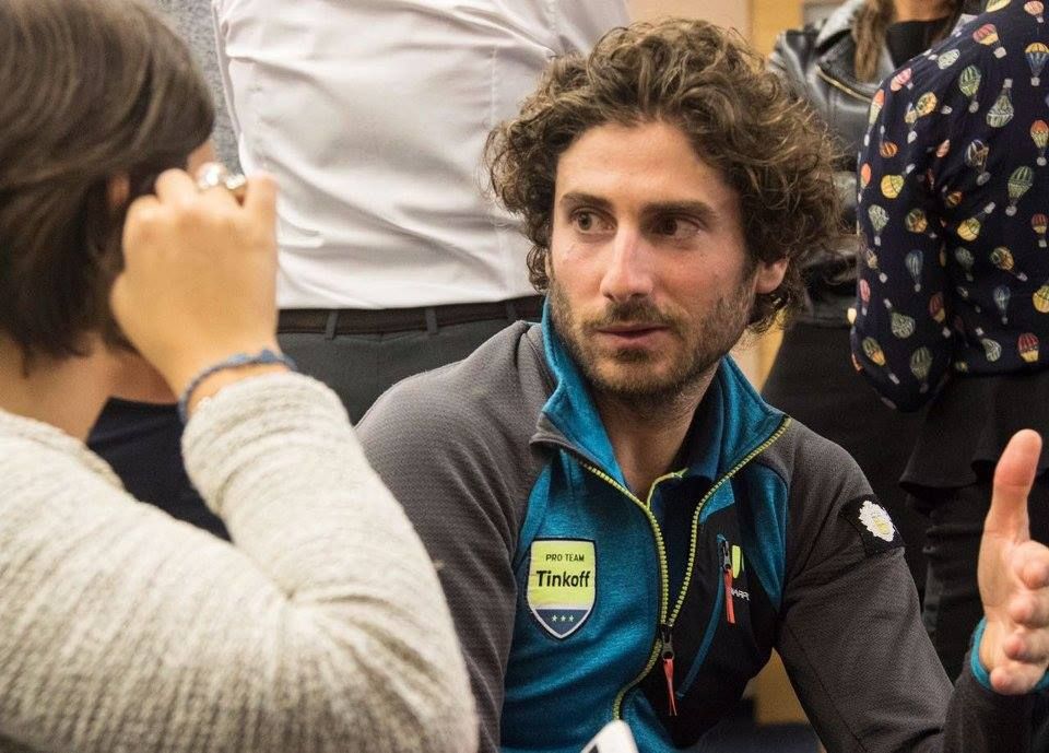 Manuele Boaro interviews with a journalist at the press conference