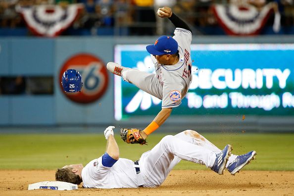 Chase Utley slides into Rubén Tejada