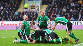 Lincoln City celebrate at Turf Moor after beating Burnley 1-0 in the FA Cup fifth round