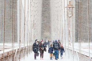 Tourists shudder on the Brooklyn Bridge in New York City during a strong blizzard. According to photographer Rudolf Sulgan, the powerful blizzard was amplified by climate change. "I made this image in 2018, during a strong blizzard as El Nino’s periodic warming of water often disrupts normal weather patterns," Sulgan told the RMS. "My main concern and inspiration is that my images hopefully do a small part in combating climate change." This photo was awarded the top prize in the 2020 RMS photo contest.
