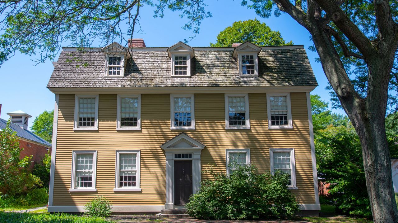 yellow and white wooden Georgian house