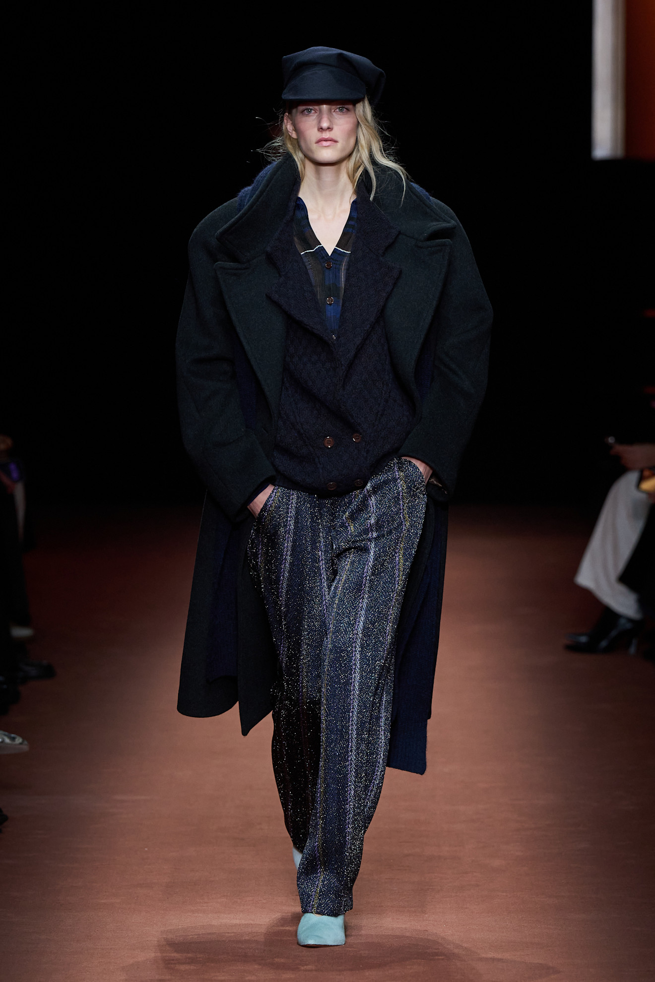 A model at the Missoni show wearing blue shoes.