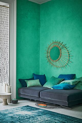 Bedroom with green velvet wall