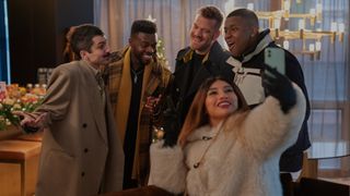 Mitch Grassi as Mitch, Kevin Olusola as Kevin, Scott Hoying as Scott, Matt Sallee as Matt and Kirstin Maldonado as Kirstin of Pentatonix in Meet Me Next Christmas