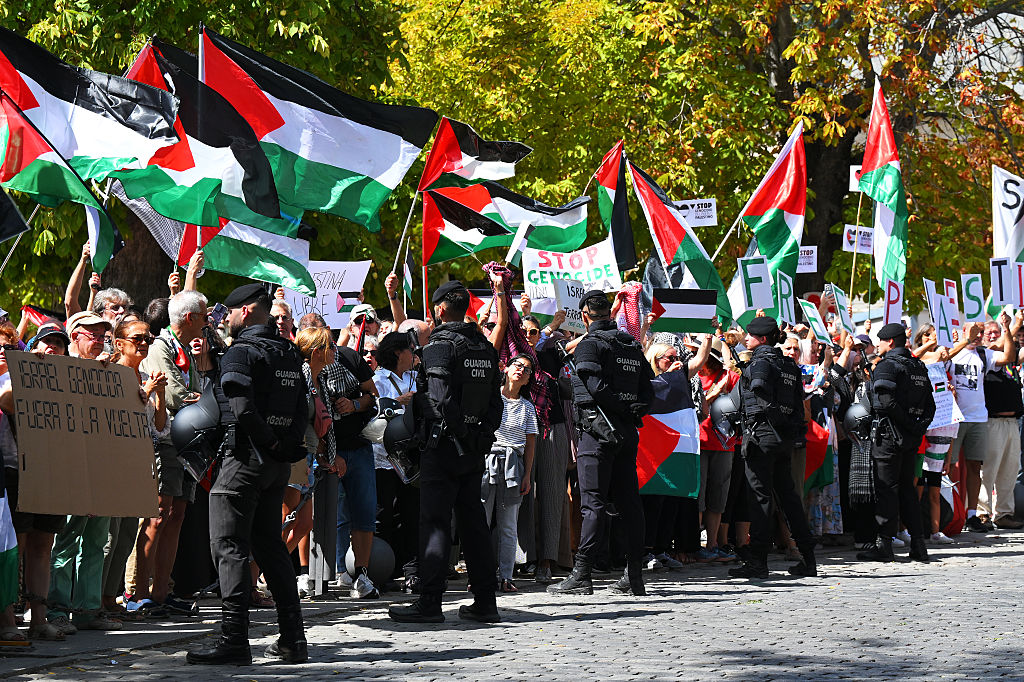 BOLA DEL MUNDO, SPAIN - SEPTEMBER 13: Pro - Palestine protesters during the La Vuelta - 80th Tour of Spain 2025, Stage 20 a 164.8km stage from Robledo de Chavela to Bola del Mundo. Puerto de Navacerrada 2253m / #UCIWT / on September 13, 2025 in Bola del Mundo. Puerto de Navacerrada, Spain. (Photo by Tim de Waele/Getty Images)