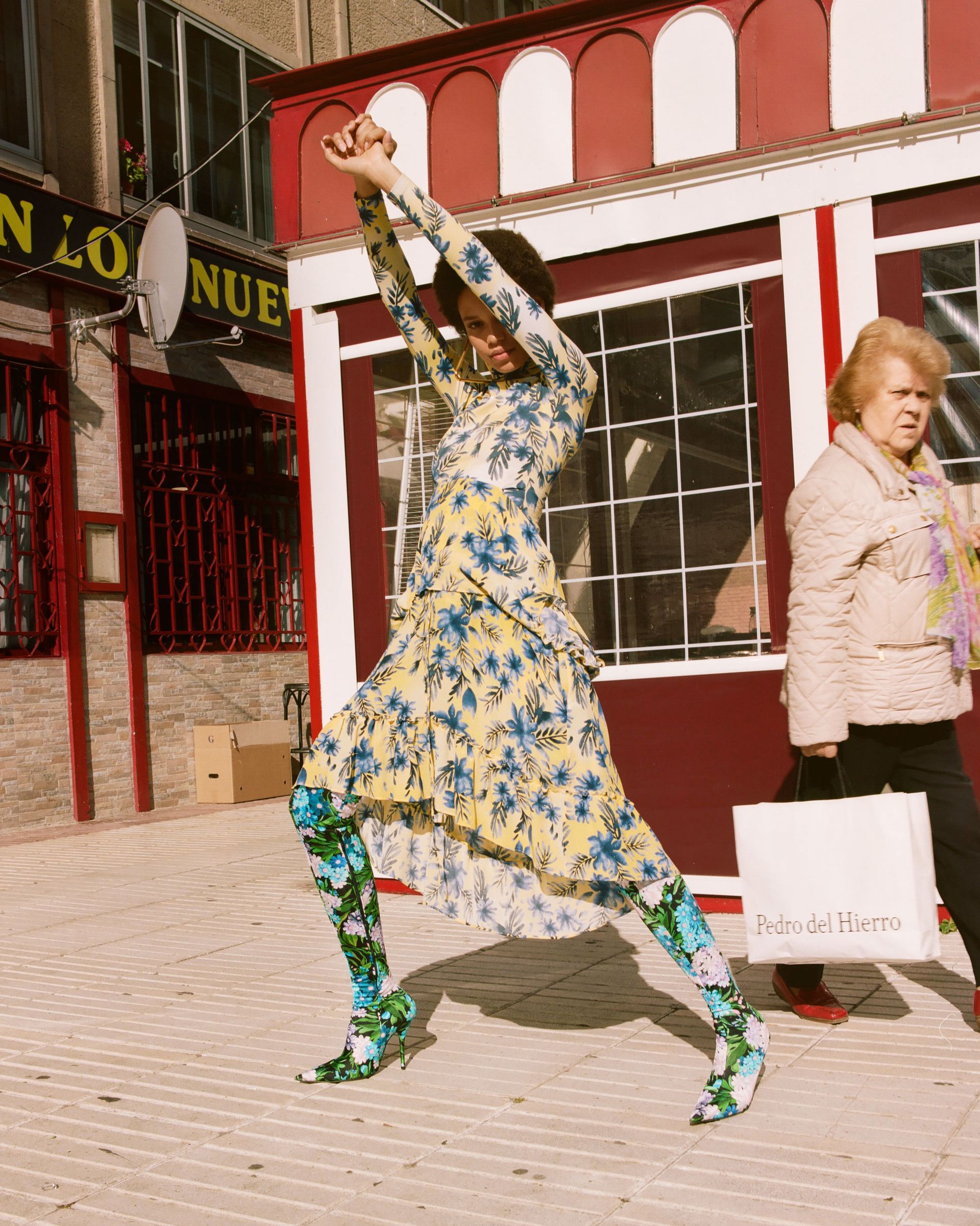 woman in floral dress and floral tall boots