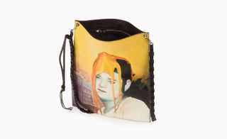 Handbag with black and white photographs over-painted with colourful watercolours