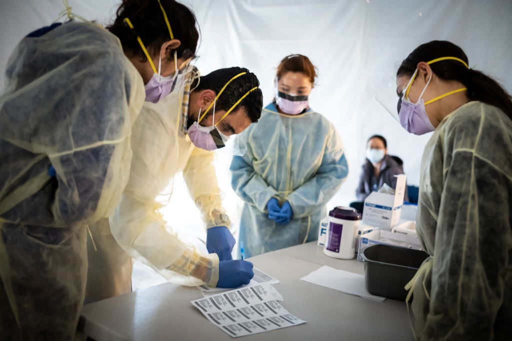 Doctors in a triage tent.