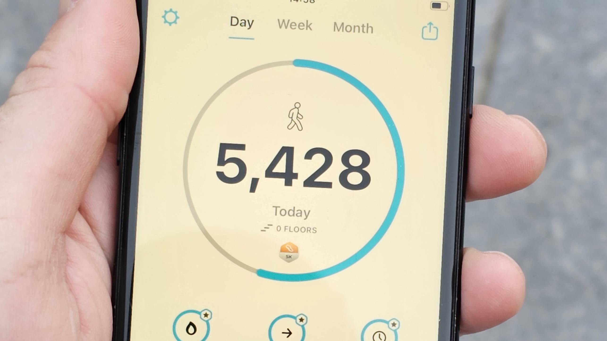 iPhone showing step counter at 5,000 steps