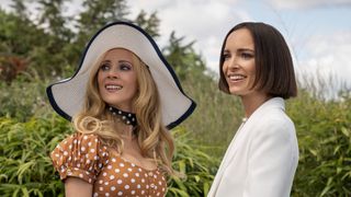 (L toR) Juno Temple as Keeley Jones wearing a big hat and Jodi Balfour as Jack at a mini golf park in Ted Lasso season 3 episode 8